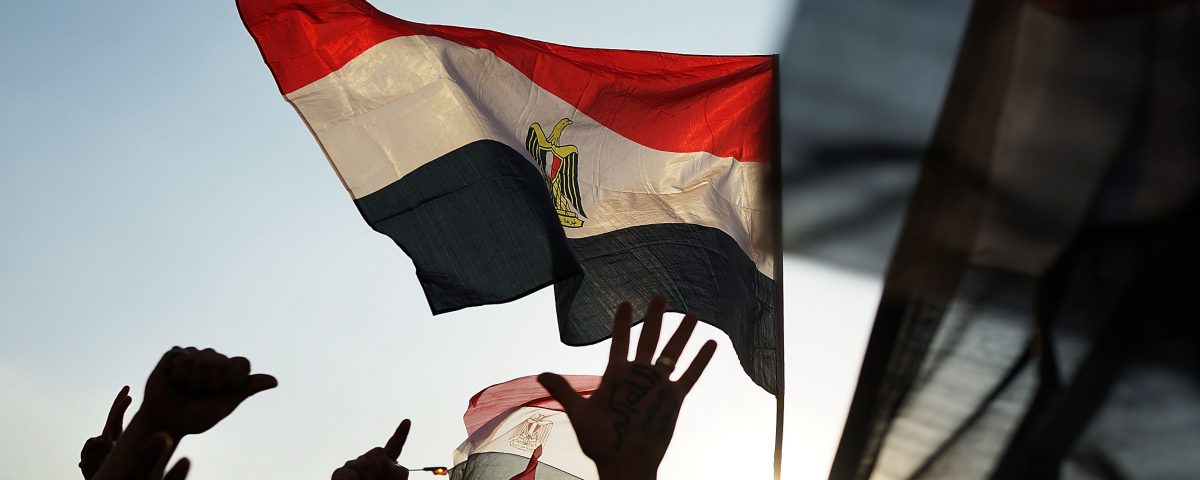 CAIRO, EGYPT - JULY 06:  Protesters opposed to ousted Egyptian President Mohamed Morsi celebrate in Tahrir Square on July 6, 2013 in Cairo, Egypt. Over 17 people were killed in clashes around the country yesterday with dozens injured as the Egyptian military tries to restore order. Adly Mansour, chief justice of the Supreme Constitutional Court, was sworn in as the interim head of state in ceremony in Cairo in the morning of July 4, the day after Morsi was placed under house arrest by the Egyptian military and the Constitution was suspended.  (Photo by Spencer Platt/Getty Images)